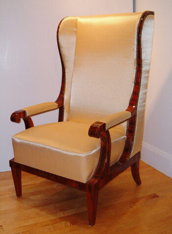 A fine and unusual Biedermeier winged back armchair