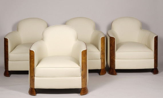 A set of four armchairs by Jules Leleu