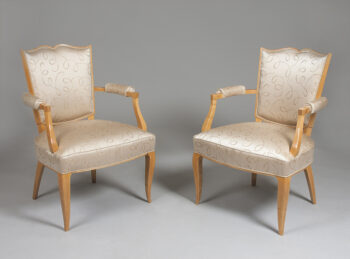 A pair of French Forties arm chairs by Rene Prou

