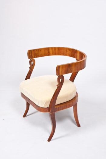 A petite Biedermeier open armchair