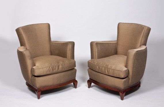 A pair of club chairs by Rene Prou