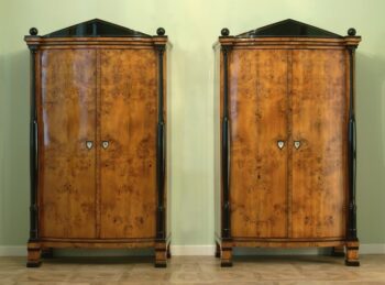 A pair of exceptional late Empire armoires