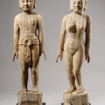 A pair of Chinese wood and polychrome figures