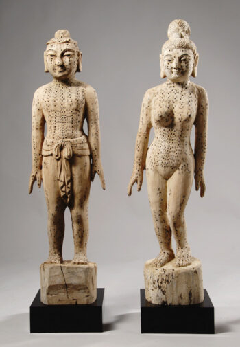A pair of Chinese wood and polychrome figures 