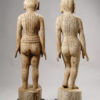 A pair of Chinese wood and polychrome figures