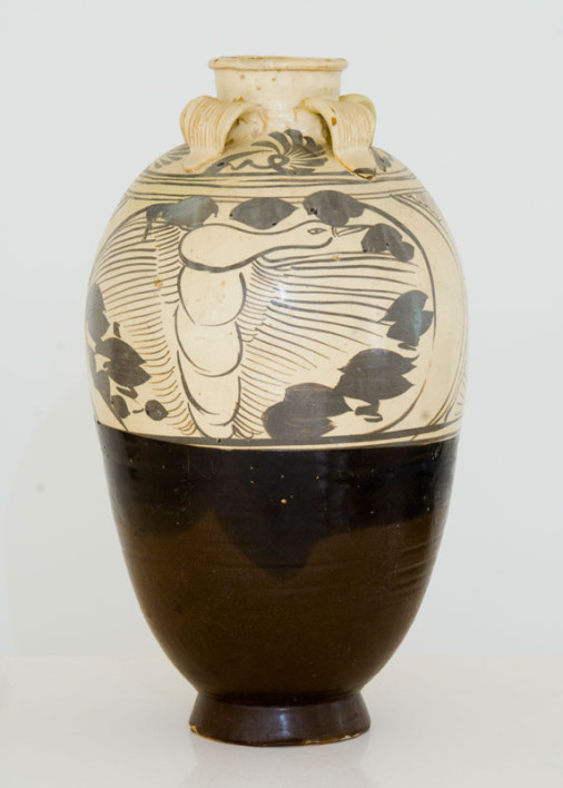 A large glazed four handled jar with