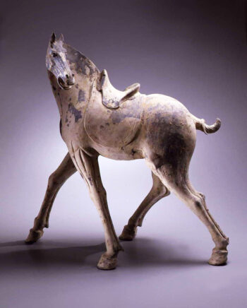 Large figure of a striding horse with turned head
