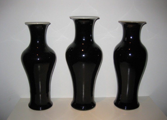 Three Mirror Black Glazed Baluster Vases