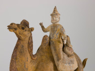 Pottery figure of Bactrian camel with foreign rider and dog on saddle 3