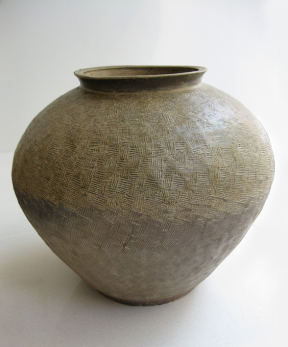 Large ash glazed jar with overall diagonal comb pattern