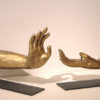 A pair of hand and arm fragments from cast Buddha