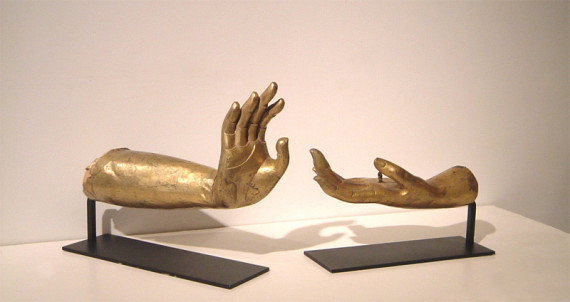 A pair of hand and arm fragments from cast Buddha