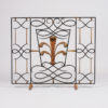 A French 40’s hand-forged iron firescreen by Gilbert Poillerat