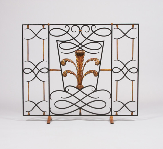 A French 40's hand-forged iron firescreen by Gilbert Poillerat