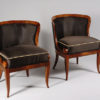 An exceptional pair of Biedermeier petite bergeres