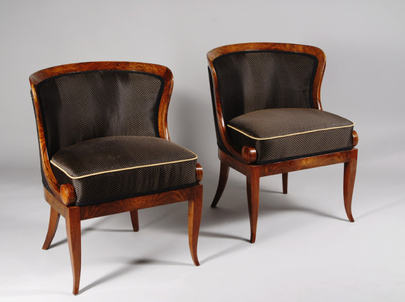 An exceptional pair of Biedermeier petite bergeres