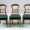 A set of three Biedermeier side chairs