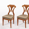 A set of three Biedermeier side chairs