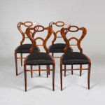 A set of four sleek and elegant Biedermeier side chairs