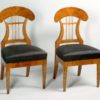 A pair of Biedermeier lyre-shaped side chairs