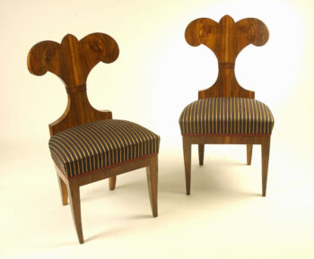 A pair of important Biedermeier side chairs