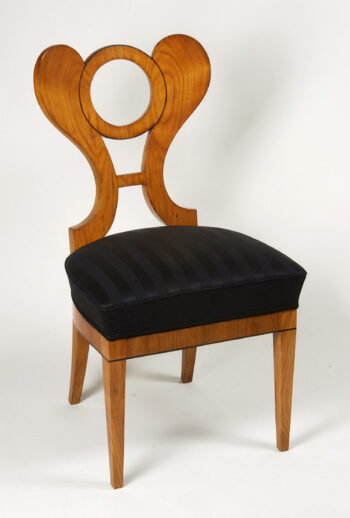 A set of four Biedermeier dining chairs