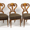 A set of three Biedermeier side chairs