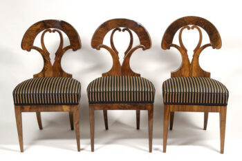 A set of three Biedermeier side chairs