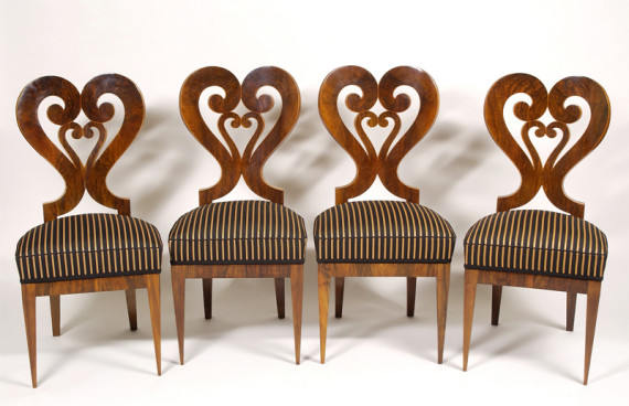 A rare and unusual set of four Biedermeier sidechairs with heart-shaped back