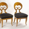 A magnificent pair of Biedermeier side chairs