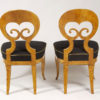 A magnificent pair of Biedermeier side chairs