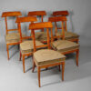 A set of unusual Biedermeier dining chairs