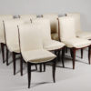 A set of ten dining chairs in rosewood after Jules Leleu