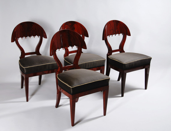 A set of four exceptional and important Biedermeier side chairs