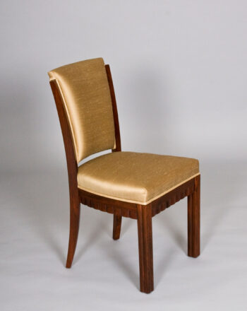 A striking set of Modernist dining chairs by Maurice Dufrene