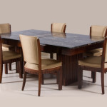 A striking set of Modernist dining chairs by Maurice Dufrene