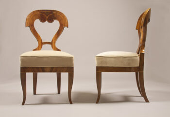 An exceptional pair of Biedermeier side chairs