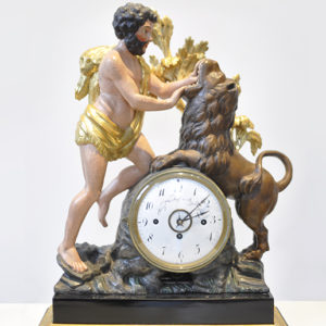 An Empire mantle clock of Hercules and the Nemean Lion