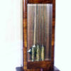 An Art Deco tall case clock with original works