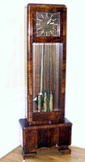 An Art Deco tall case clock with original works