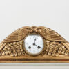 A handsome carved and gilt mantle clock by Paul Follot