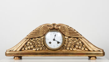 A handsome carved and gilt mantle clock with birds and foliage. Clock works stamped S H Paris
