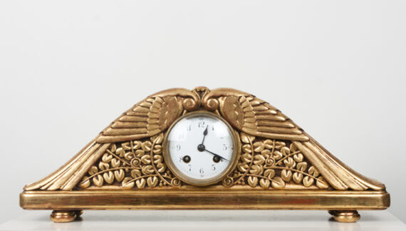 A handsome carved and gilt mantle clock with birds and foliage. Clock works stamped S H Paris