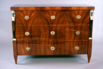 An Empire three drawer commode