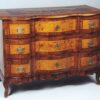 A Baroque three drawer commode