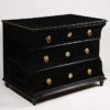 An unusual concave front Biedermeier three drawer commode