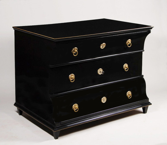 An unusual concave front Biedermeier three drawer commode