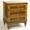 A Neoclassical small chest of drawers