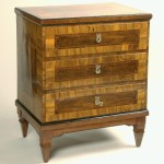 A Neoclassical small chest of drawers