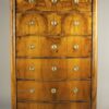 A Biedermeier six drawer tall chest of drawers